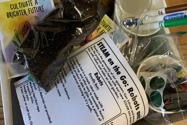 A box of materials for making a Doodle Bot and a Mini Garden