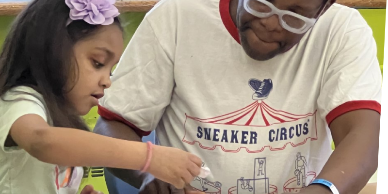 sensory art workshop father and daughter creating marbled painting with water color infused foam