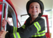 boy dressed as a firefighter in Ladder 11