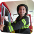 boy dressed as a firefighter in Ladder 11