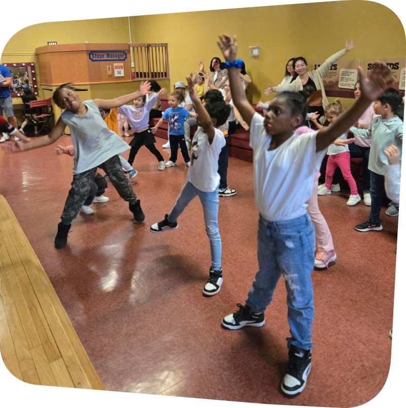 Kids dancing in Portia's Playhouse