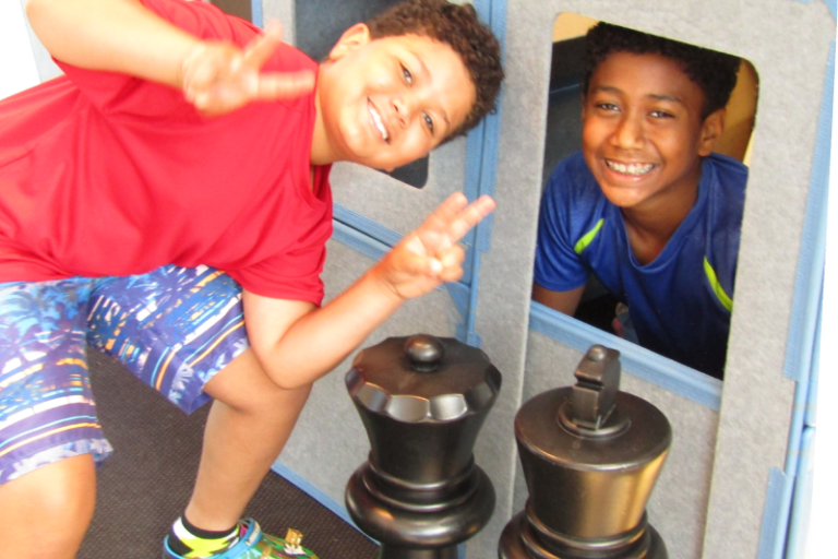 two boys playing at magna builders