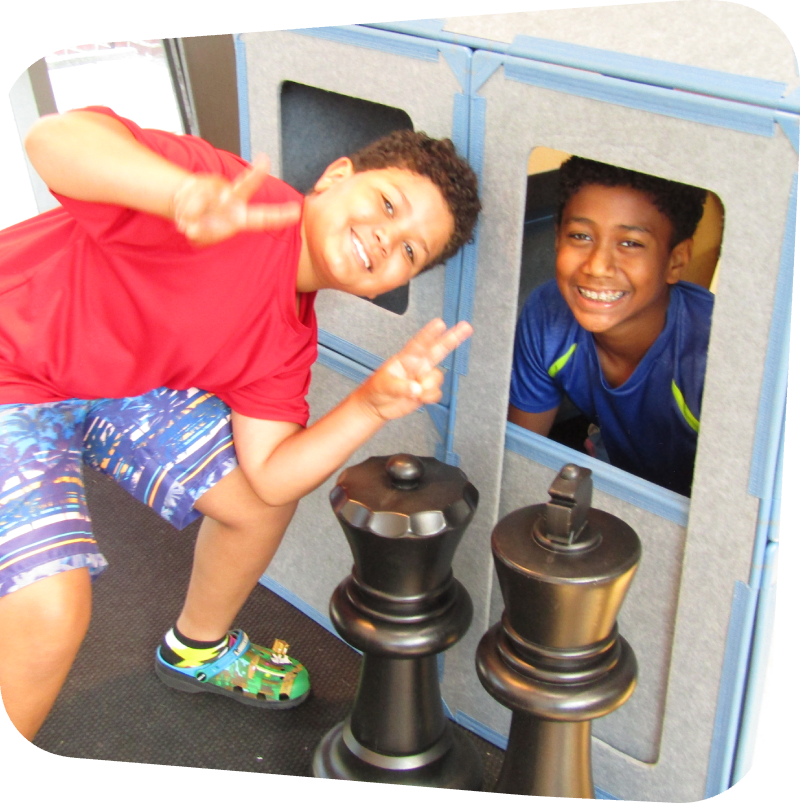two boys playing at magna builders