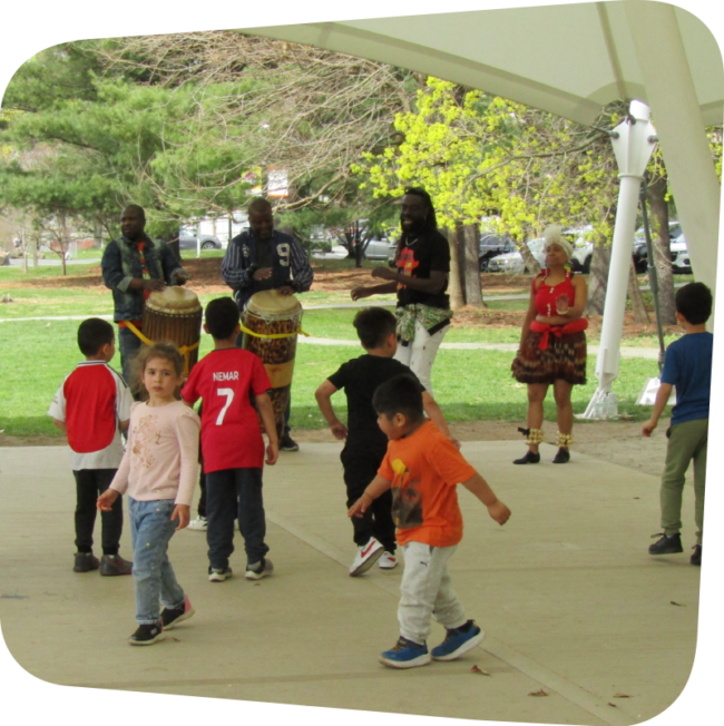 Kids dancing under the tent at Cumbe performance