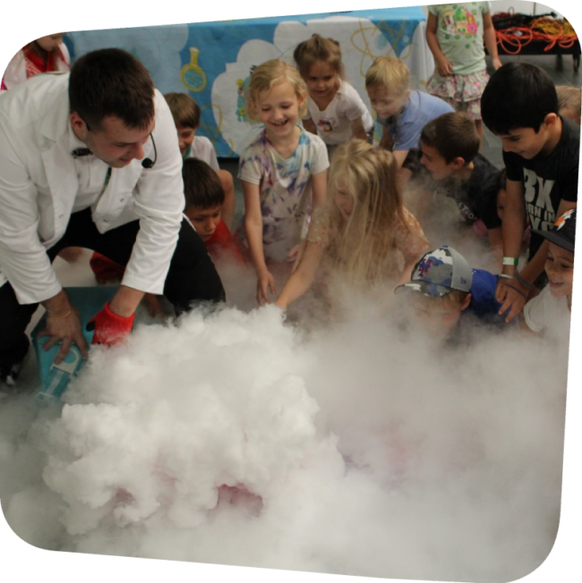 kids surrounded by dry ice in the gallery