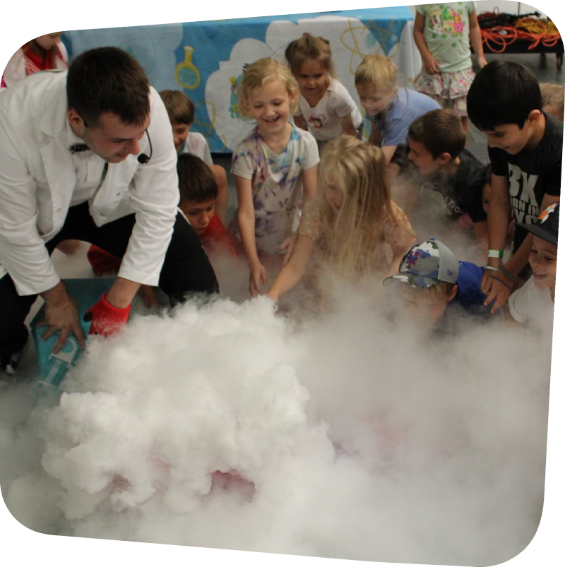 kids surrounded by dry ice in the gallery