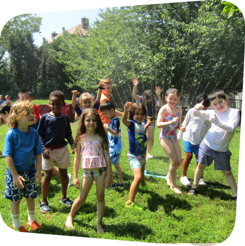 kids playing in sprinklers