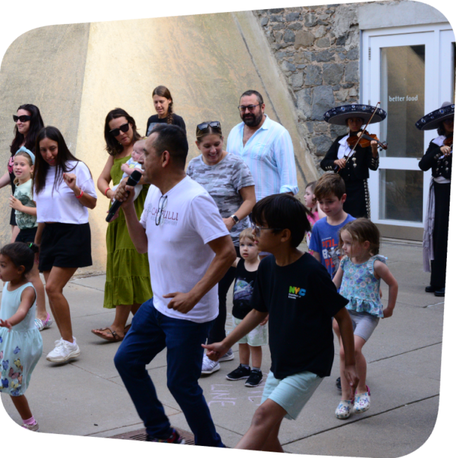 calpulli rhombus Calpulli dance instructor showing kids dance moves at the Staten Island Children's Museum