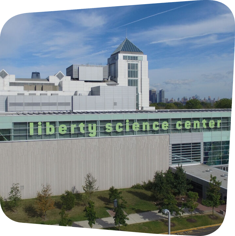 side of the liberty science center building with name of the museum visible